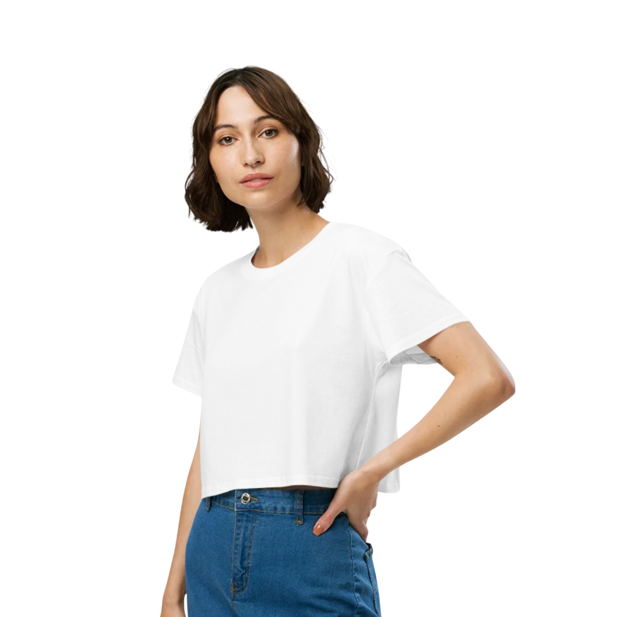 Woman wearing white cropped t-shirt with blue jeans, casual streetwear style