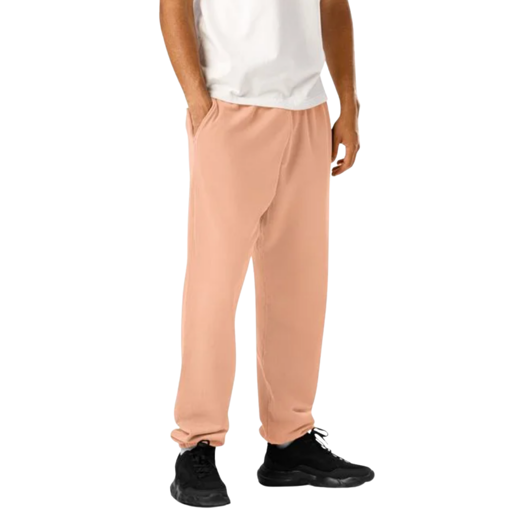 Soft peach joggers with relaxed fit, paired with white tee and black sneakers for casual streetwear style