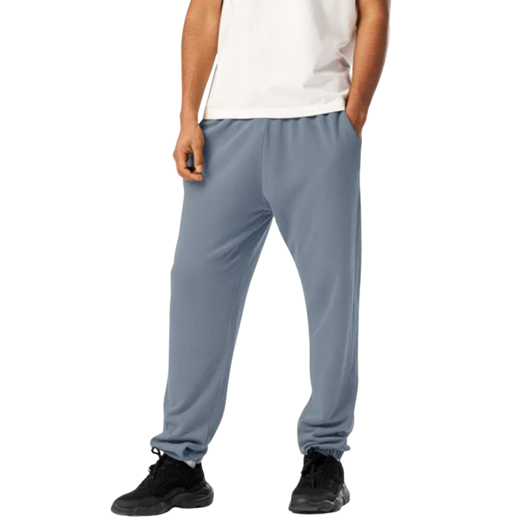 Men's light blue jogger pants with elastic cuffs, paired with white tee and black sneakers for casual streetwear style