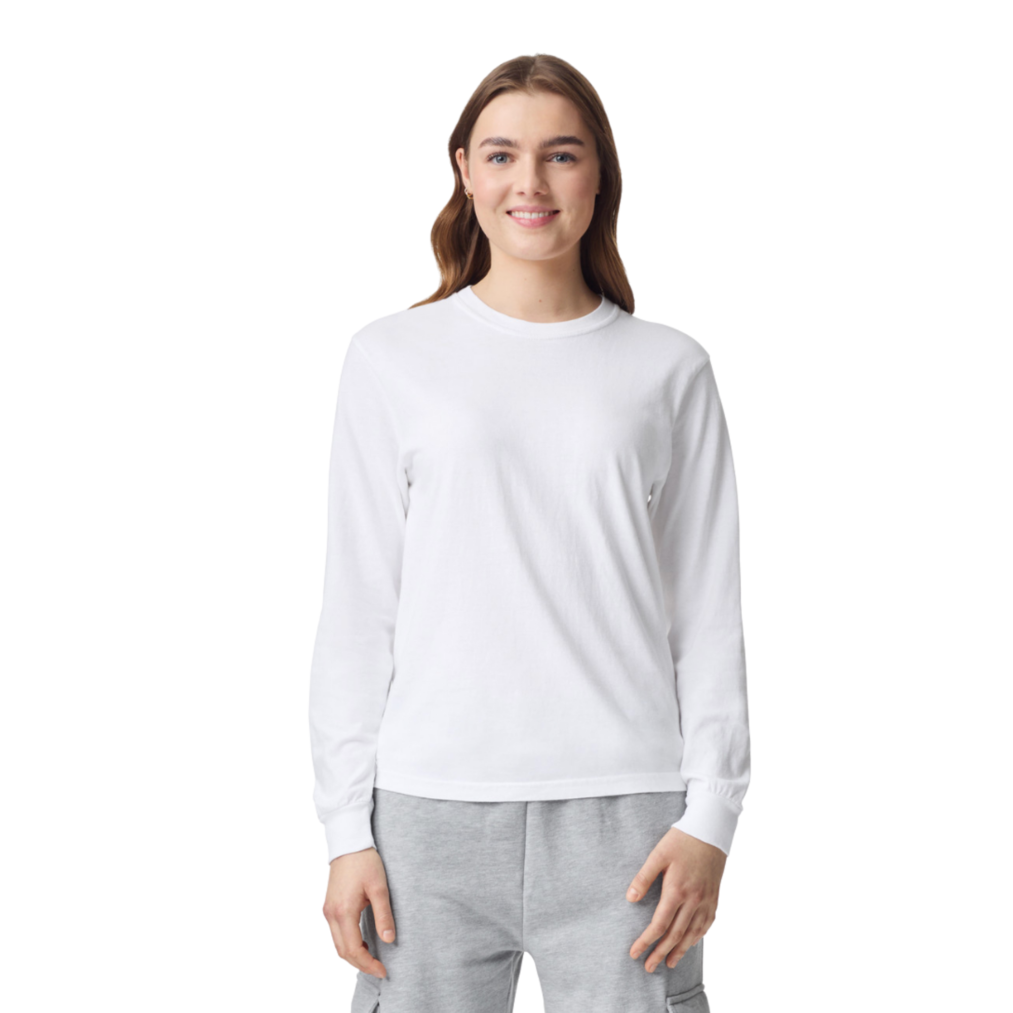 Woman wearing white long sleeve t-shirt with gray sweatpants, casual streetwear style