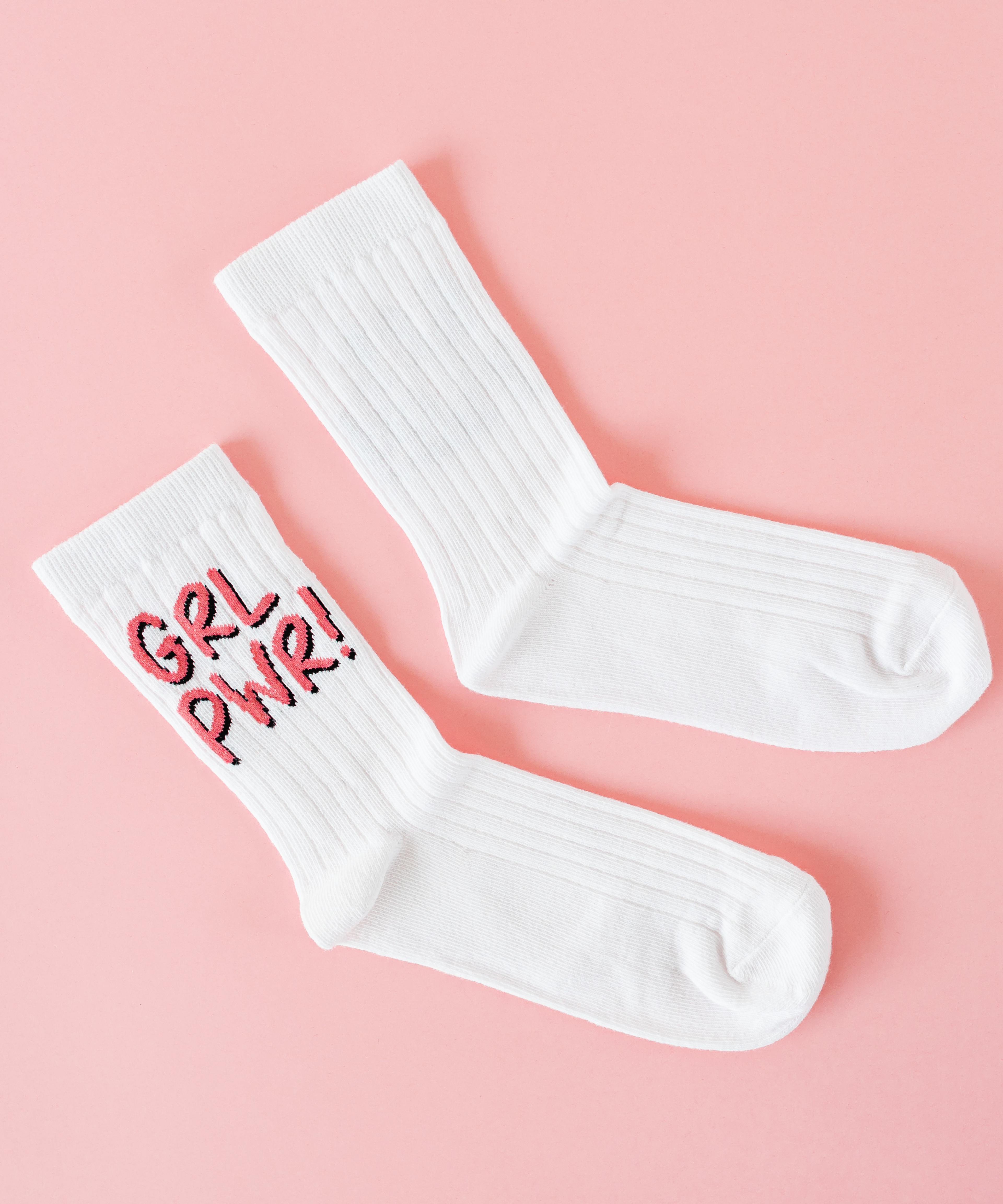 White socks with 'GRL PWR!' text on a pink background, INKTHEORYSTUDIO, INK THEORY STUDIO